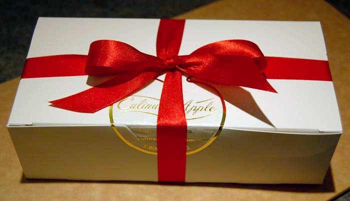 red ribbon gift wrapping box of fudge